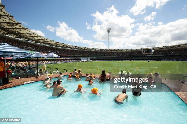 Fans enjoy the pool deck during day two of the First Test Match of the 2017/18 Ashes Series between Australia and England at The Gabba on November...