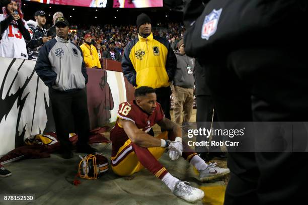 Wide receiver Josh Doctson of the Washington Redskins sits on the sideline after catching a fourth quarter touchdown pass against the New York Giants...