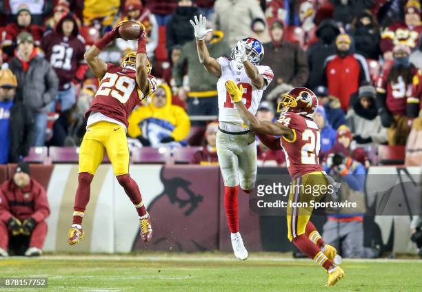 Washington Redskins cornerback Kendall Fuller intercept a pass intended for New York Giants wide receiver Travis Rudolph during a NFL game between...