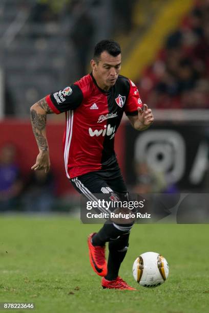 Daniel Arreola of Atlas drives the ball during the quarter finals first leg match between Atlas and Monterrey as part of the Torneo Apertura 2017...