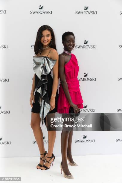 Kelly Gale and Adut Akech attends the Swarovski Rainbow Paradise Spring Summer 18 Collection Launch on November 24, 2017 in Sydney, Australia.
