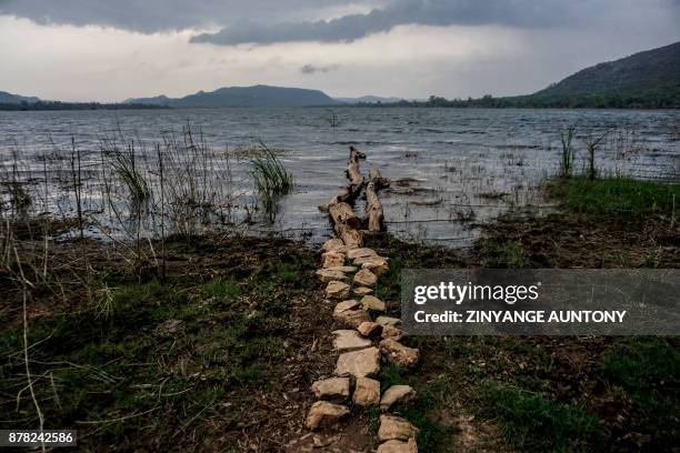Picture taken on November 23, 2017 shows a view of Mazowe dam, Mashonaland Central Province. Since 2014, villagers in Mazowe had endured a torrid...