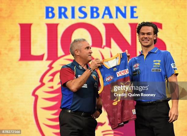 Lions head coach Chris Fagan poses with Cameron Rayner during the 2017 AFL Draft at Sydney Showgrounds on November 24, 2017 in Sydney, Australia.