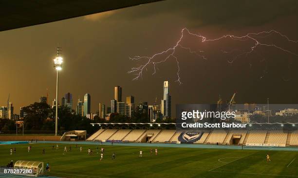 General view as lightning strikes near buildings in the city of Melbourne during the round eight W-League match between the Melbourne Victory and...