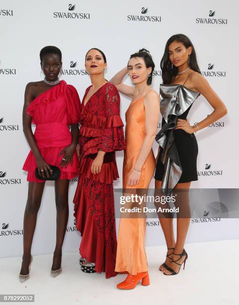 Adut Akech, George Maple, Isabel Manfredi and Kelly Gale attend the Swarovski Rainbow Paradise Spring Summer 18 Collection Launch on November 24,...