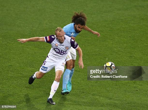 Mitchell Nichols of the Glory is challenged by Osama Malik of the City during the round eight A-League match between Melbourne City and Perth Glory...