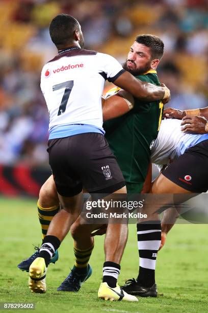 Matt Gillett of Australia is tackled during the 2017 Rugby League World Cup Semi Final match between the Australian Kangaroos and Fiji at Suncorp...