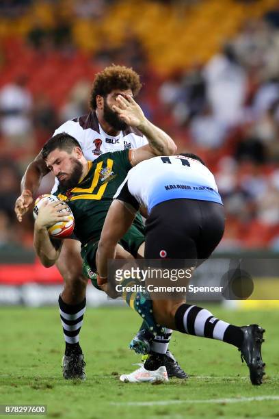 Matt Gillett of the Kangaroos is tackled during the 2017 Rugby League World Cup Semi Final match between the Australian Kangaroos and Fiji at Suncorp...
