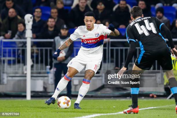 Memphis Depay of Lyon and Hector Yuste of Limassol during europa league match between Olympique Lyonnais and Apollon Limassol at Parc Olympique on...