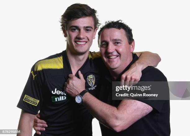 Patrick Naish of the Tigers poses with his father Chris Naish during the 2017 AFL Draft at Sydney Showgrounds on November 24, 2017 in Sydney,...