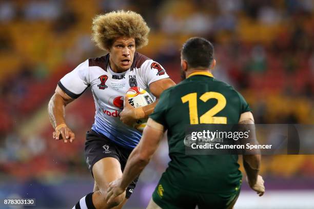 Ashton Sims of Fiji is tackled during the 2017 Rugby League World Cup Semi Final match between the Australian Kangaroos and Fiji at Suncorp Stadium...