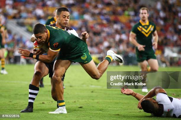 Dane Gagai of Australia break the tackle of Jarryd Hayne of Fiji to score a try during the 2017 Rugby League World Cup Semi Final match between the...