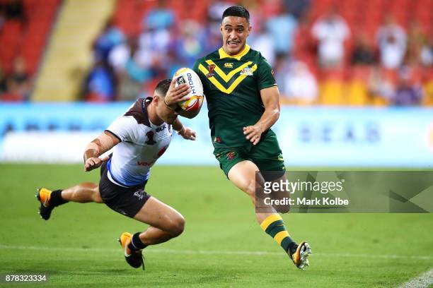 Valentine Holmes of Australia breaks away to score his seventh try during the 2017 Rugby League World Cup Semi Final match between the Australian...