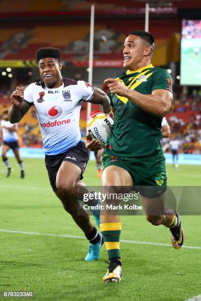 Valentine Holmes of Australia breaks away to score his seventh try during the 2017 Rugby League World Cup Semi Final match between the Australian...