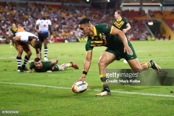 Valentine Holmes of Australia scores a try during the 2017 Rugby League World Cup Semi Final match between the Australian Kangaroos and Fiji at...