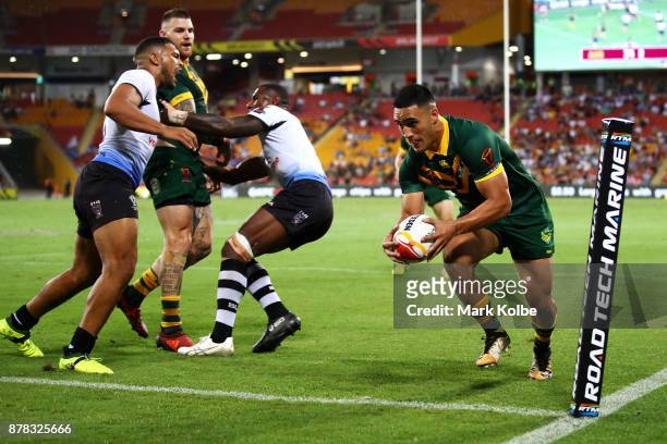 Valentine Holmes of Australia scores a try during the 2017 Rugby League World Cup Semi Final match between the Australian Kangaroos and Fiji at...