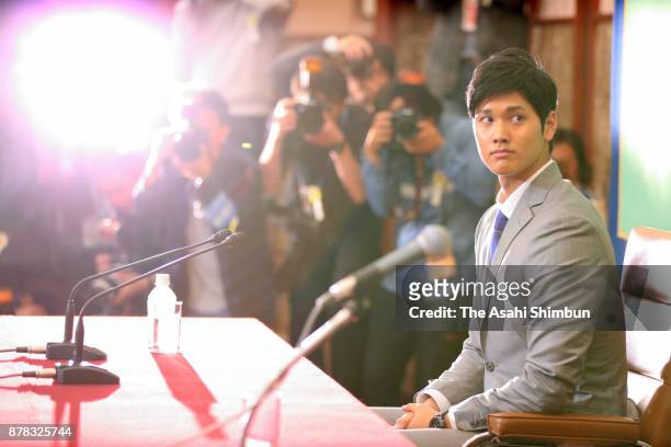 Shohei Otani of Hokkaido Nippon Ham Fighters attends a press conference announcing his challenge to the Major League Basenall at the Japan National...