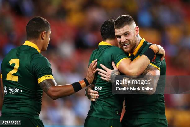 Billy Slater of Australia celebrates with his team mate Josh Dugan of Australia after scoring a try during the 2017 Rugby League World Cup Semi Final...