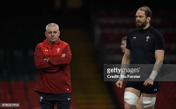 Wales coach Warren Gatland and captain Alun Wyn Jones look on during training ahead of their International tomorrow against The New Zealand All...