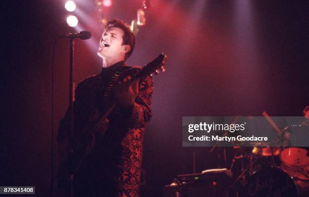 American musician Chris Isaak performs on stage at the Town and Country Club, Kentish Town, London, 1991.