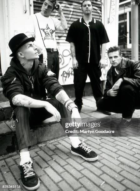 Group portrait of Rancid in Amsterdam, Netherlands, 1995. L-R Tim Armstrong, Lars Frederiksen, Matt Freeman, Brett Reed.