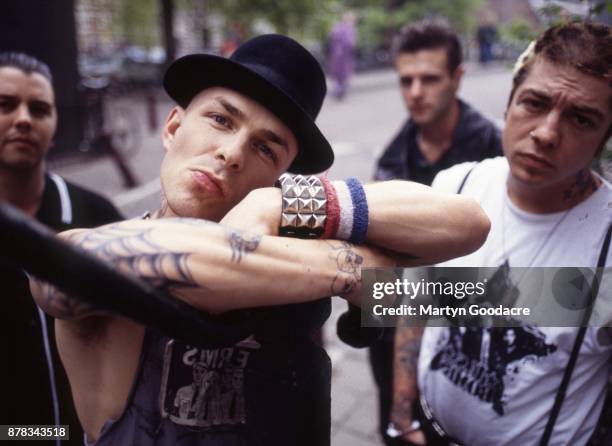 Group portrait of Rancid in Amsterdam, Netherlands, 1995. L-R Matt Freeman, Tim Armstrong, Brett Reed, Lars Frederiksen.
