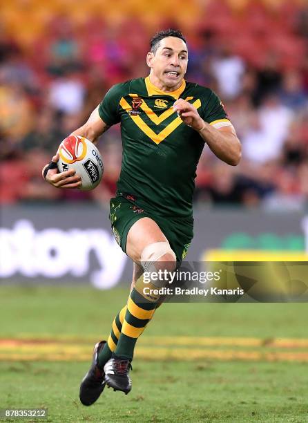 Billy Slater of Australia breaks away from the defence during the 2017 Rugby League World Cup Semi Final match between the Australian Kangaroos and...
