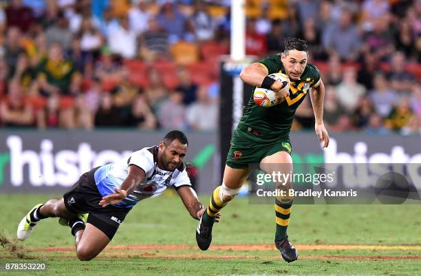 Billy Slater of Australia breaks away from the defence during the 2017 Rugby League World Cup Semi Final match between the Australian Kangaroos and...