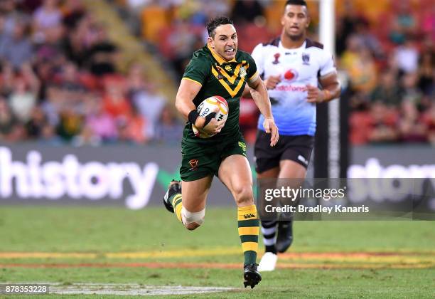 Billy Slater of Australia breaks away from the defence during the 2017 Rugby League World Cup Semi Final match between the Australian Kangaroos and...