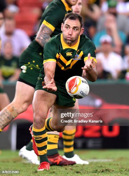 Cameron Smith of Australia passes the ball during the 2017 Rugby League World Cup Semi Final match between the Australian Kangaroos and Fiji at...