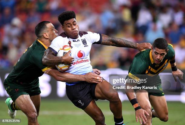 Kevin Naiqama of Fiji takes on the defence during the 2017 Rugby League World Cup Semi Final match between the Australian Kangaroos and Fiji at...