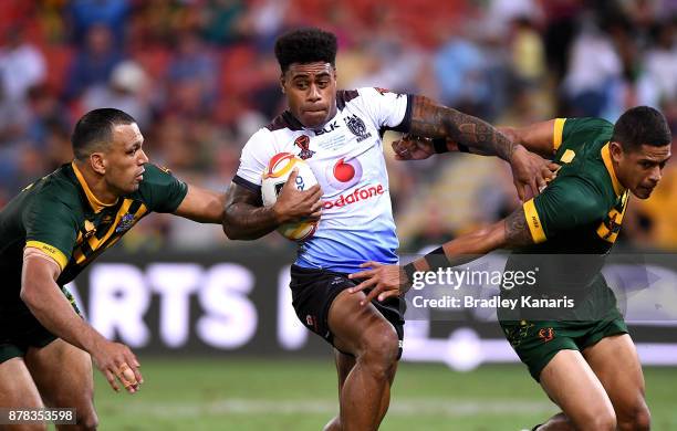 Kevin Naiqama of Fiji takes on the defence during the 2017 Rugby League World Cup Semi Final match between the Australian Kangaroos and Fiji at...