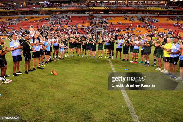 Players from both sides join together to sing a song after the 2017 Rugby League World Cup Semi Final match between the Australian Kangaroos and Fiji...