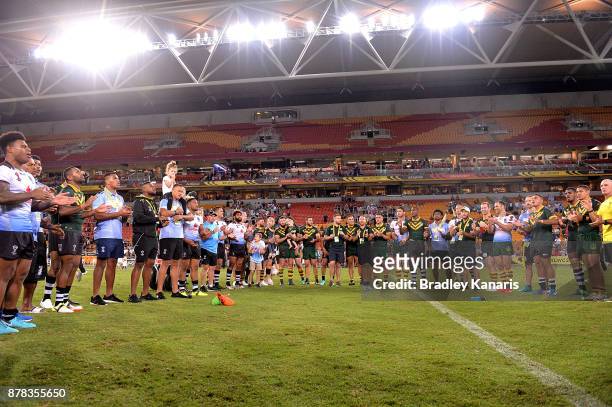 Players from both sides join together to sing a song after the 2017 Rugby League World Cup Semi Final match between the Australian Kangaroos and Fiji...