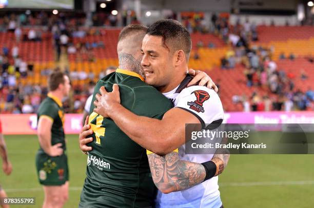 Josh Dugan of Australia and Jarryd Hayne of Fiji embrace after the 2017 Rugby League World Cup Semi Final match between the Australian Kangaroos and...