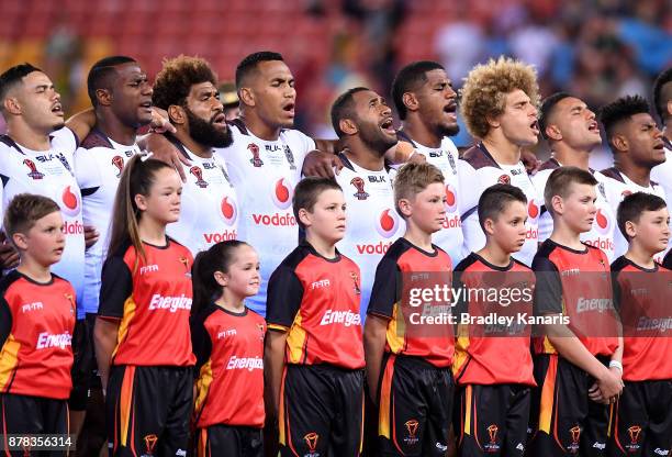 Fijian players embrace for their national anthem before the 2017 Rugby League World Cup Semi Final match between the Australian Kangaroos and Fiji at...