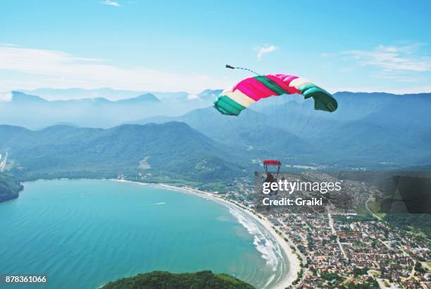 flying over the coast - brazil - paragliding stock pictures, royalty-free photos & images