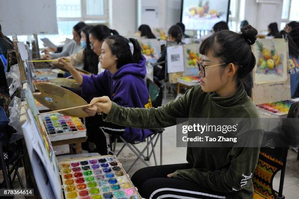 Student painting to major in art prepare for the upcoming college entrance exam at a training institute in Harbin, China's Heilongjiang province, on...