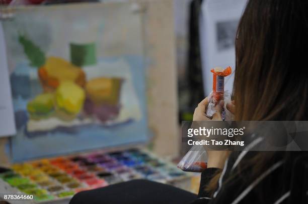 Student eating some food at a training institute in Harbin, China's Heilongjiang province, on November 24 ,2017. Art colleges in China make their own...