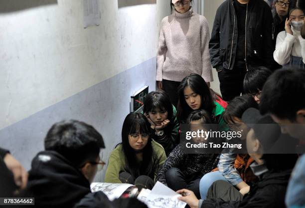 Teacher talking about minimum academic standard to Senior high school students at a training institute in Harbin, China's Heilongjiang province, on...