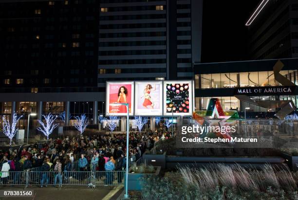 People line up for a Black Friday giveaway outside the Mall of America on November 24, 2017 in Bloomington, Minnesota.