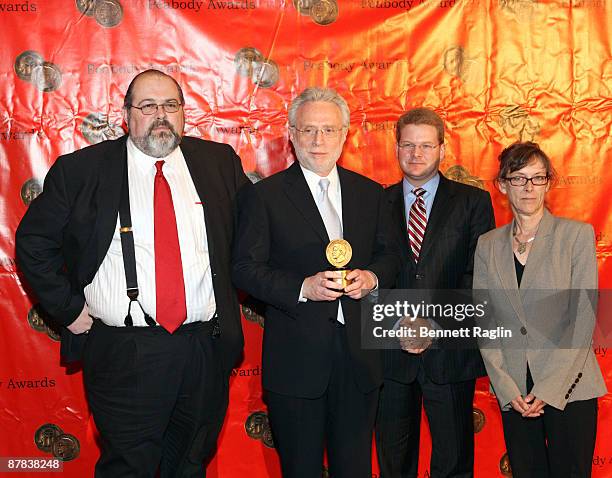 Washington Bureau Chief David Bohrman, CNN anchor Wolf Blitzer, CNN Political Director Sam Feist and VP of CNN Special Events Jane Maxwell receive...