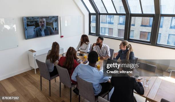 video conference at the office - face time stock pictures, royalty-free photos & images