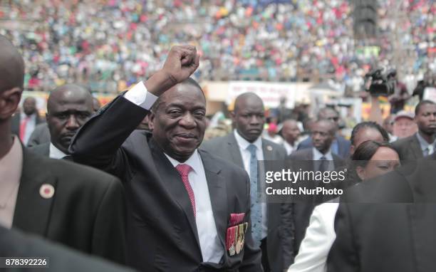 New interim Zimbabwean President Emmerson Mnangagwa walks after he was officially sworn-in during a ceremony in Harare on November 24, 2017....