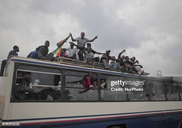 Zimbabweans make their way to the National Sports Stadium in Harare for the inauguration of interim President Emmerson Mnangagwa on November 24,...