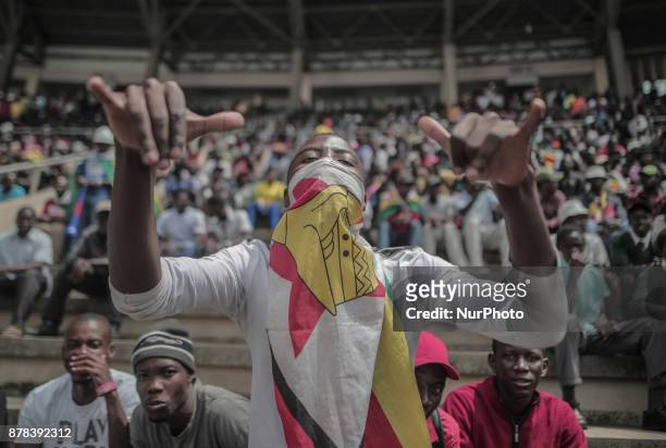 The crowd cheers and dances at the presidential inauguration ceremony of Emmerson Mnangagwa in Harare, Zimbabwe, Friday, November 24, 2017. Mnangagwa...