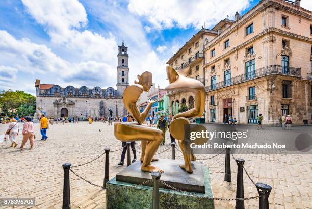 La Conversacion' sculpture by Etienne in the Saint Francis of Assisi plaza. The convent or church of the same name can be seen in the background. The...