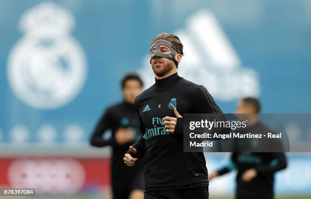 Sergio Ramos of Real Madrid warms up during a training session at Valdebebas training ground on November 24, 2017 in Madrid, Spain.