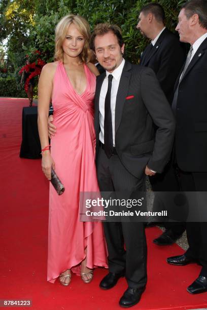 Malin Ackerman and Roberto Zincone arrive at the Akvinta Presents A Night of Hollywood Domino Party at The House at Cannes during the 62nd...