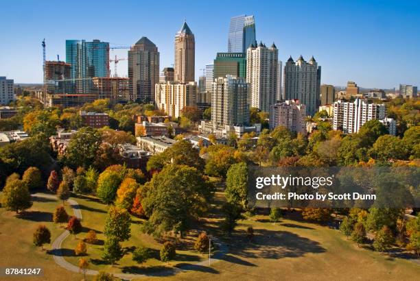 atlanta's growing skyline - piedmont park atlanta georgia stock pictures, royalty-free photos & images